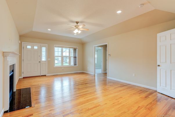 Empty room, Fireplace, Interior, Recessed Lighting, Wood Texture Flooring