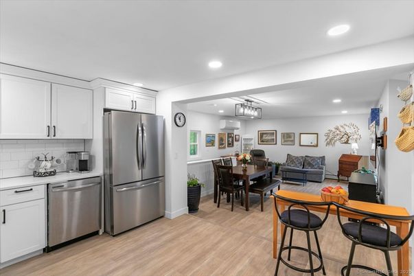 Dining room, Interior, Kitchen, Recessed Lighting, Stainless Steel Appliances, Wood Texture Flooring