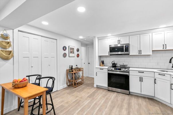 Interior, Kitchen, Recessed Lighting, Stainless Steel Appliances, Wood Texture Flooring