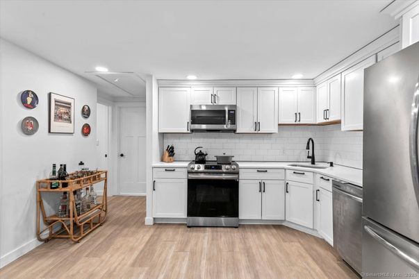 Interior, Kitchen, Recessed Lighting, Stainless Steel Appliances, Wood Texture Flooring
