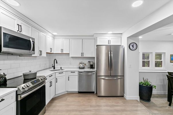 Interior, Kitchen, Recessed Lighting, Stainless Steel Appliances, Wood Texture Flooring