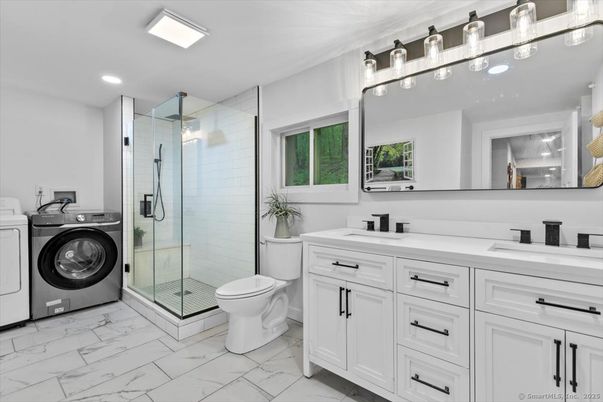 Bathroom, Dual Sink Vanities, Glass Shower, Interior, Marble, Recessed Lighting