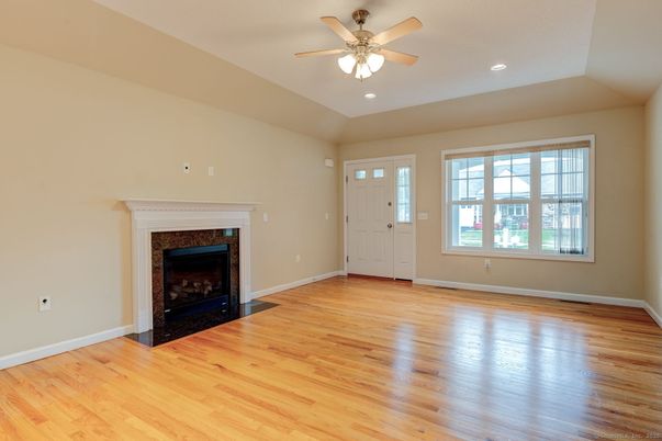 Empty room, Fireplace, Interior, Recessed Lighting, Wood Texture Flooring