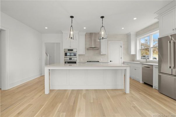 Interior, Kitchen, Pendant Lights, Recessed Lighting, Stainless Steel Appliances, Wood Texture Flooring