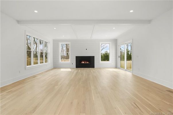 Empty room, Fireplace, Interior, Recessed Lighting, Wood Texture Flooring