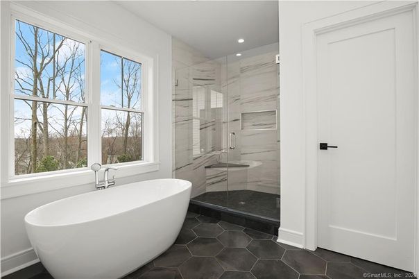 Bathroom, Free Standing Baths, Glass Shower, Interior, Marble Walls, Recessed Lighting