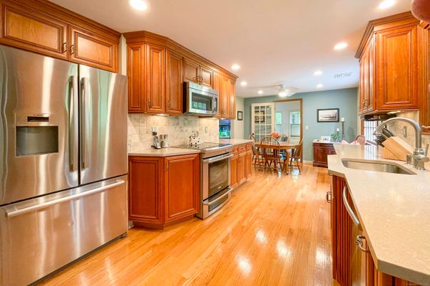 Dining room, Interior, Kitchen, Recessed Lighting, Stainless Steel Appliances, Wood Texture Flooring