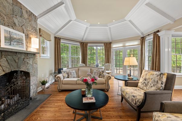 Fireplace, Interior, Living room, Recessed Lighting, Stone Walls, Wood Texture Flooring