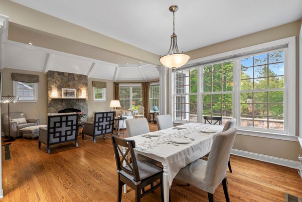 Dining room, Fireplace, Interior, Living room, Pendant Lights, Recessed Lighting, Stone Walls, Wood Texture Flooring