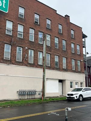 Exterior, Facade, Brick Facade, Condo Building