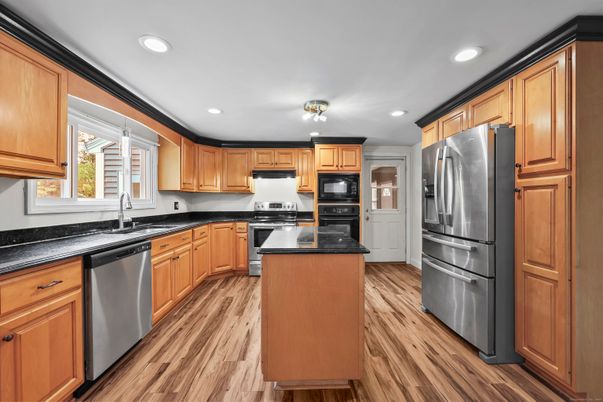 Interior, Kitchen, Recessed Lighting, Stainless Steel Appliances, Wood Texture Flooring