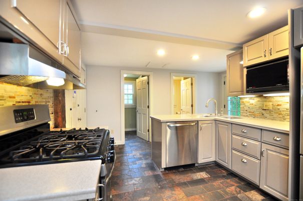 Interior, Kitchen, Recessed Lighting, Stainless Steel Appliances, Stone Walls