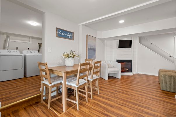 Dining room, Fireplace, Interior, Recessed Lighting, Washer, Wood Texture Flooring