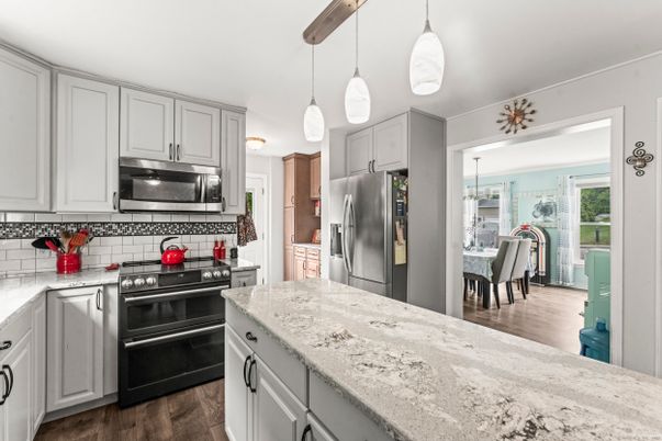 Dining room, Interior, Kitchen, Pendant Lights, Stainless Steel Appliances, Wood Texture Flooring