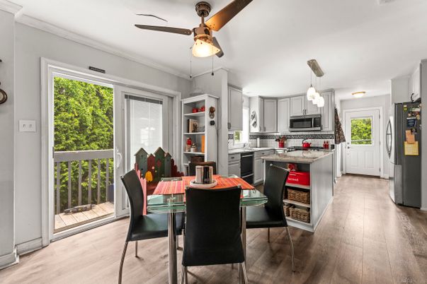 Dining room, Interior, Kitchen, Pendant Lights, Stainless Steel Appliances, Wood Texture Flooring