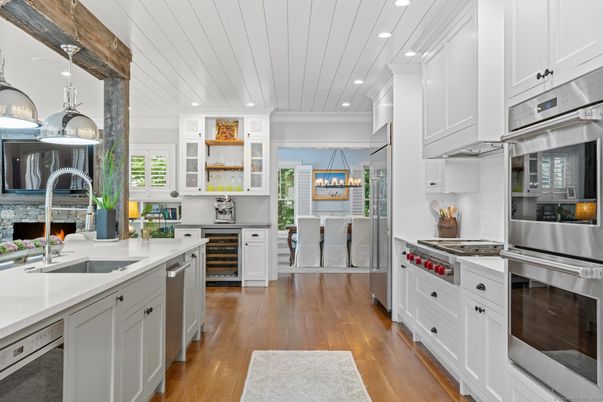 Fireplace, Interior, Kitchen, Pendant Lights, Recessed Lighting, Stainless Steel Appliances, Wood Texture Flooring