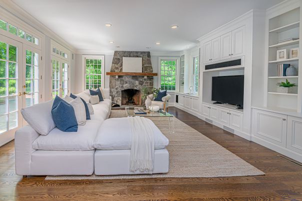 Fireplace, Interior, Living room, Recessed Lighting, Stone Walls, Wood Texture Flooring