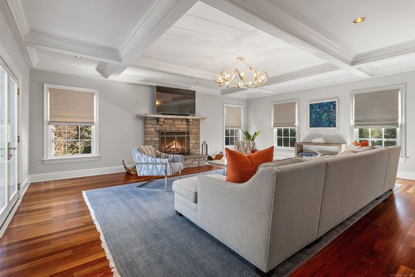 Chandelier, Fireplace, Interior, Living room, Recessed Lighting, Wood Texture Flooring