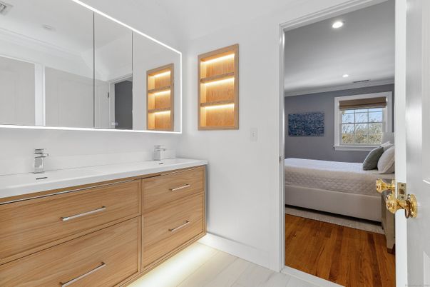 Bathroom, Dual Sink Vanities, Interior, Recessed Lighting, Wood Texture Flooring