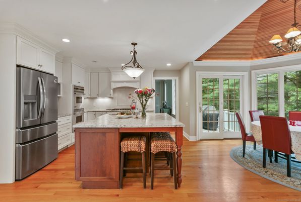 Chandelier, Dining room, Interior, Kitchen, Pendant Lights, Recessed Lighting, Stainless Steel Appliances, Wood Texture Flooring