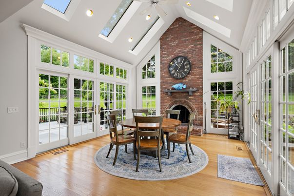 Dining room, Fireplace, Glass Ceilings, Interior, Recessed Lighting, Stone Walls, Sun Room, Wood Texture Flooring