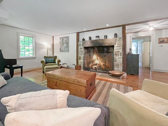 Fireplace, Interior, Living room, Recessed Lighting, Stone Walls, Wood Texture Flooring