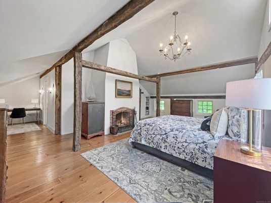 Bedroom, Chandelier, Fireplace, Interior, Wood Texture Flooring