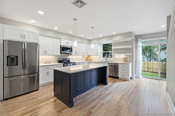 Interior, Kitchen, Pendant Lights, Recessed Lighting, Stainless Steel Appliances, Wood Texture Flooring