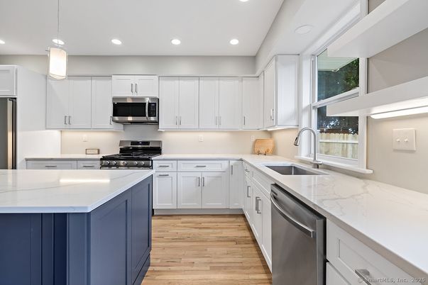 Interior, Kitchen, Pendant Lights, Recessed Lighting, Stainless Steel Appliances, Wood Texture Flooring