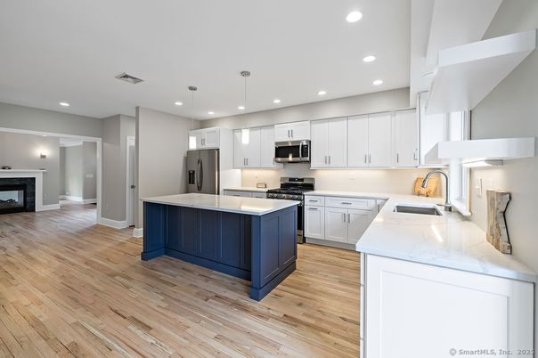 Interior, Kitchen, Pendant Lights, Recessed Lighting, Stainless Steel Appliances, Wood Texture Flooring