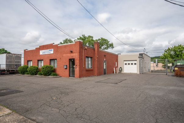 Attached, Exterior, Facade, Brick Facade, Spanish Mediterranean