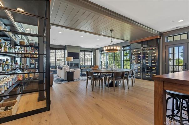 Chandelier, Dining room, Fireplace, Interior, Living room, Recessed Lighting, Wood Texture Flooring