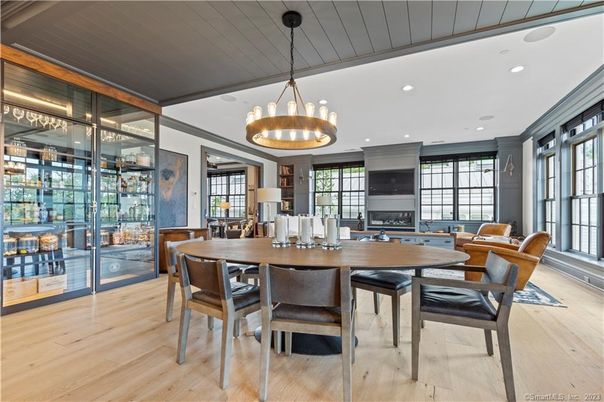 Dining room, Fireplace, Interior, Pendant Lights, Recessed Lighting, Wood Texture Flooring