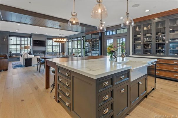 Chandelier, Dining room, Fireplace, Interior, Kitchen, Living room, Pendant Lights, Recessed Lighting, Wood Texture Flooring