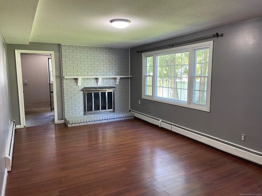 Empty room, Fireplace, Interior, Stone Walls, Wood Texture Flooring