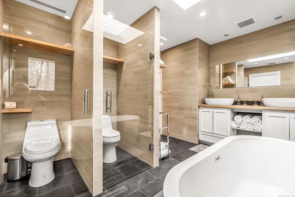 Bathroom, Dual Sink Vanities, Free Standing Baths, Glass Shower, Interior, Recessed Lighting, Wooden Walls