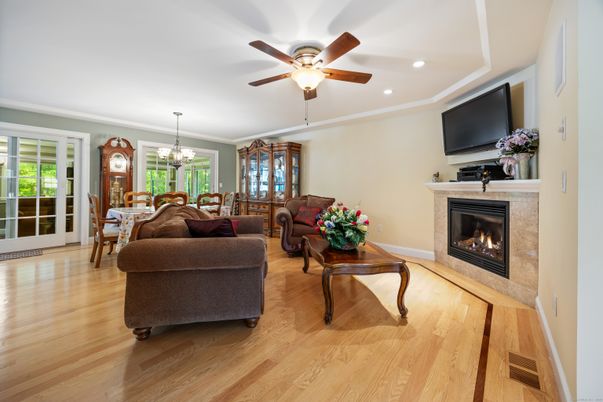 Chandelier, Dining room, Fireplace, Interior, Living room, Recessed Lighting, Wood Texture Flooring