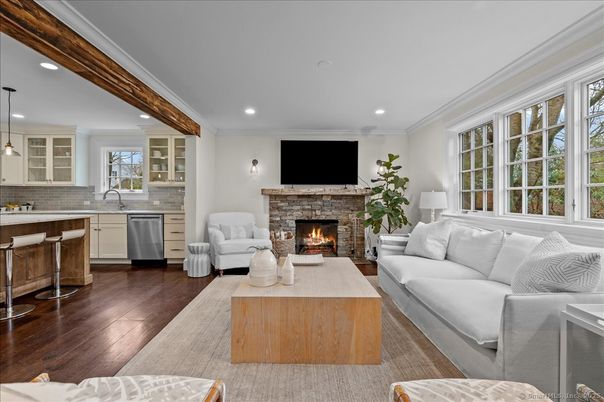 Fireplace, Interior, Kitchen, Living room, Pendant Lights, Recessed Lighting, Stainless Steel Appliances, Wood Texture Flooring