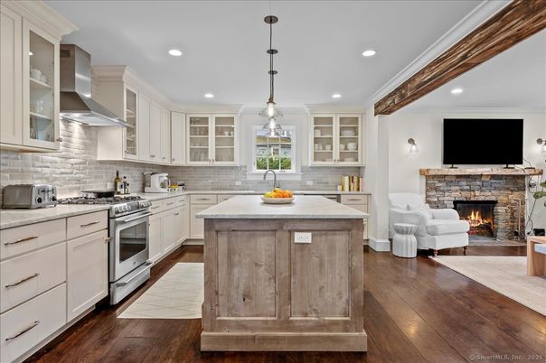 Fireplace, Interior, Kitchen, Pendant Lights, Recessed Lighting, Stainless Steel Appliances, Wood Texture Flooring