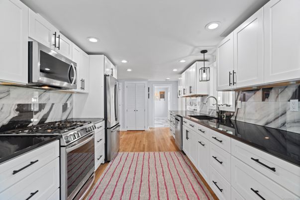 Interior, Kitchen, Pendant Lights, Recessed Lighting, Stainless Steel Appliances, Wood Texture Flooring