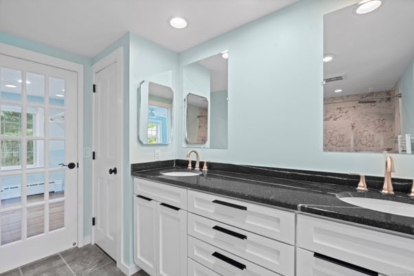 Bathroom, Dual Sink Vanities, Interior, Marble Walls, Recessed Lighting