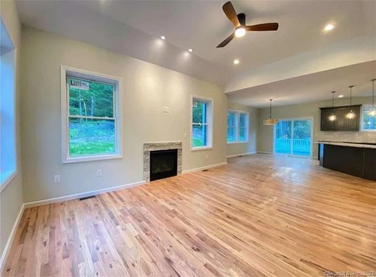 Empty room, Fireplace, Interior, Pendant Lights, Recessed Lighting, Wood Texture Flooring