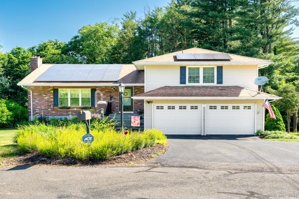 Attached, Exterior, Facade, Brick Facade, Solar Panels, Split Level