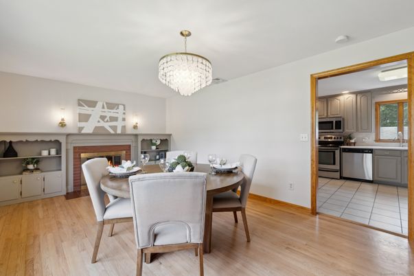 Chandelier, Dining room, Interior, Kitchen, Stainless Steel Appliances, Wood Texture Flooring