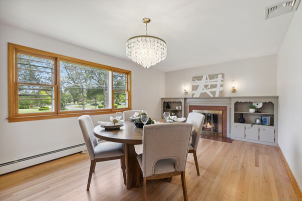 Chandelier, Dining room, Fireplace, Interior, Wood Texture Flooring