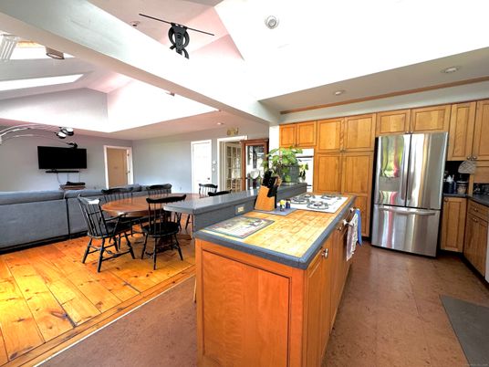Dining room, Interior, Kitchen, Living room, Recessed Lighting, Stainless Steel Appliances, Wood Texture Flooring