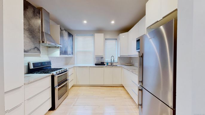 Interior, Kitchen, Recessed Lighting, Stainless Steel Appliances, Wood Texture Flooring