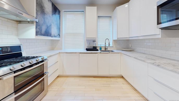 Interior, Kitchen, Recessed Lighting, Stainless Steel Appliances, Wood Texture Flooring