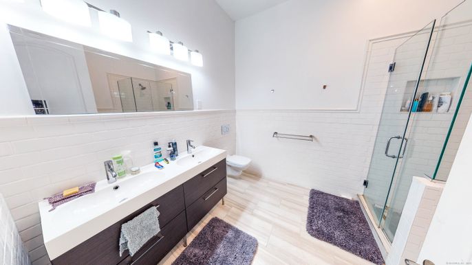 Bathroom, Dual Sink Vanities, Glass Shower, Interior, Wood Texture Flooring