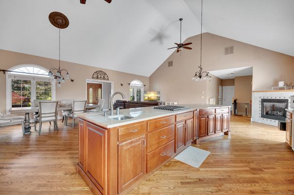 Chandelier, Dining room, Fireplace, Interior, Kitchen, Pendant Lights, Wood Texture Flooring